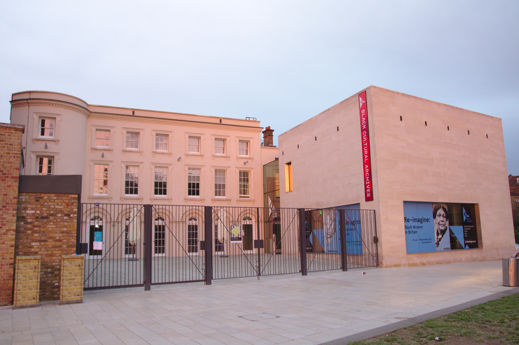 Modern and traditional buildings side by side, one labeled as "Black Cultural Archives." | Modern and traditional buildings side by side, one labeled as "Black Cultural Archives."