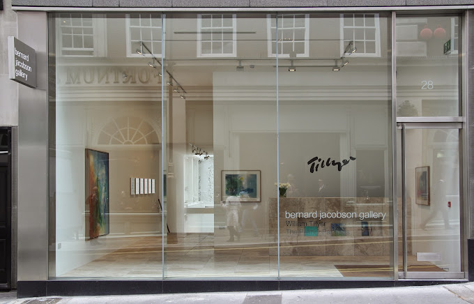 Glass-fronted art gallery facade with visible interior artwork and gallery signage. | Bernard Jacobson Gallery