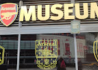 Exterior of Arsenal Museum with club logos and "MUSEUM" signage. | Arsenal Museum