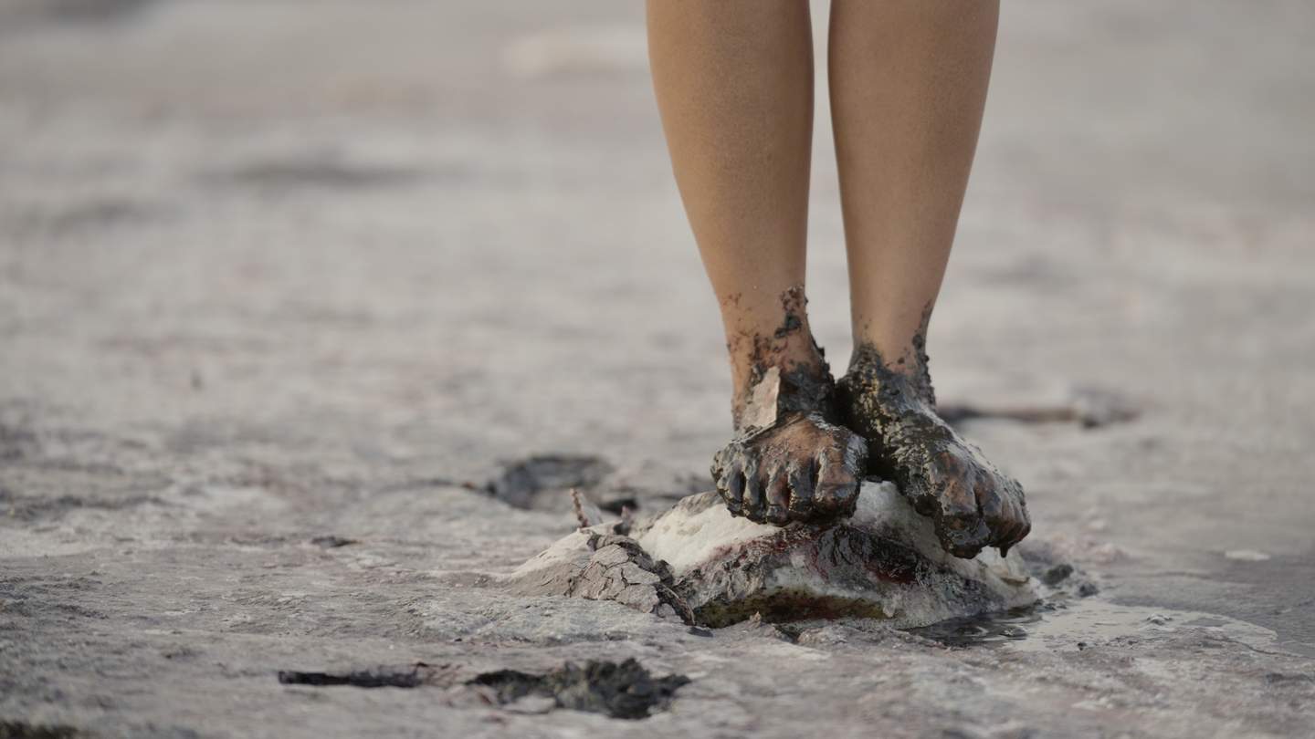 Human Feet in Mud