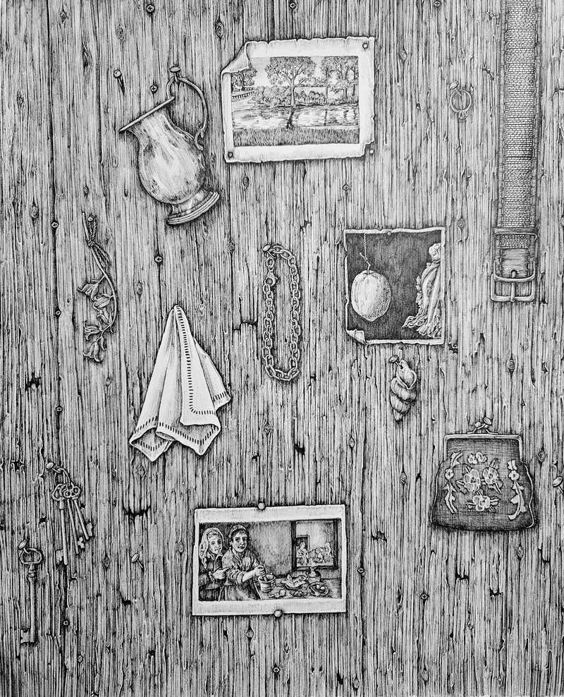 A wooden wall with various items: a pitcher, photos, a cloth, a chain, keys, and a decorative bag create a nostalgic display.