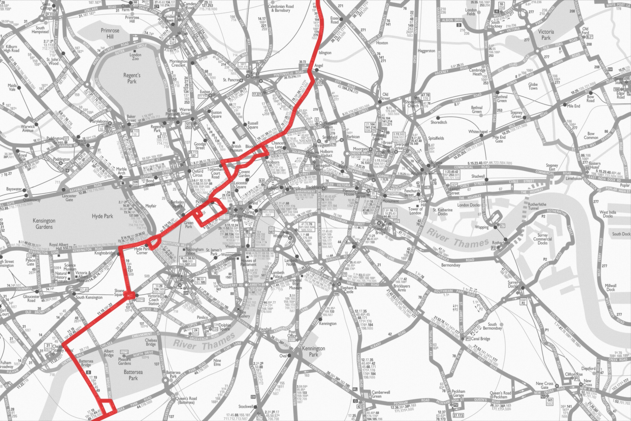A black and white map of London featuring a highlighted red route and marked locations, including parks and key intersections.