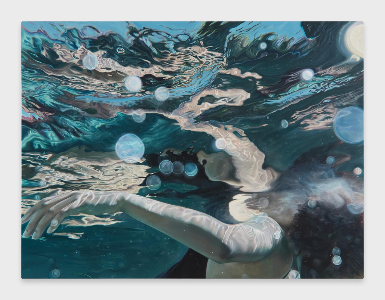 A surreal underwater scene featuring a partially submerged figure, surrounded by shimmering bubbles and abstract reflections in vibrant blues.