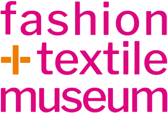 A black background featuring the words "fashion -I-textile museum" in white text, showcasing a clean and modern typography style.