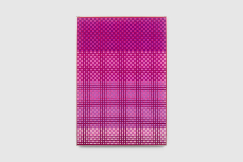 A square pattern featuring shades of pink and purple in a geometric design.