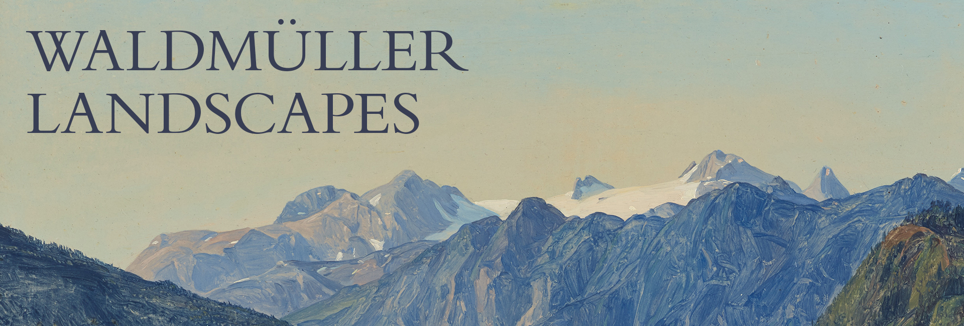 A panoramic view of a snow-covered mountain range with rugged ridges and summits, showcasing the beauty of nature in a landscape setting.