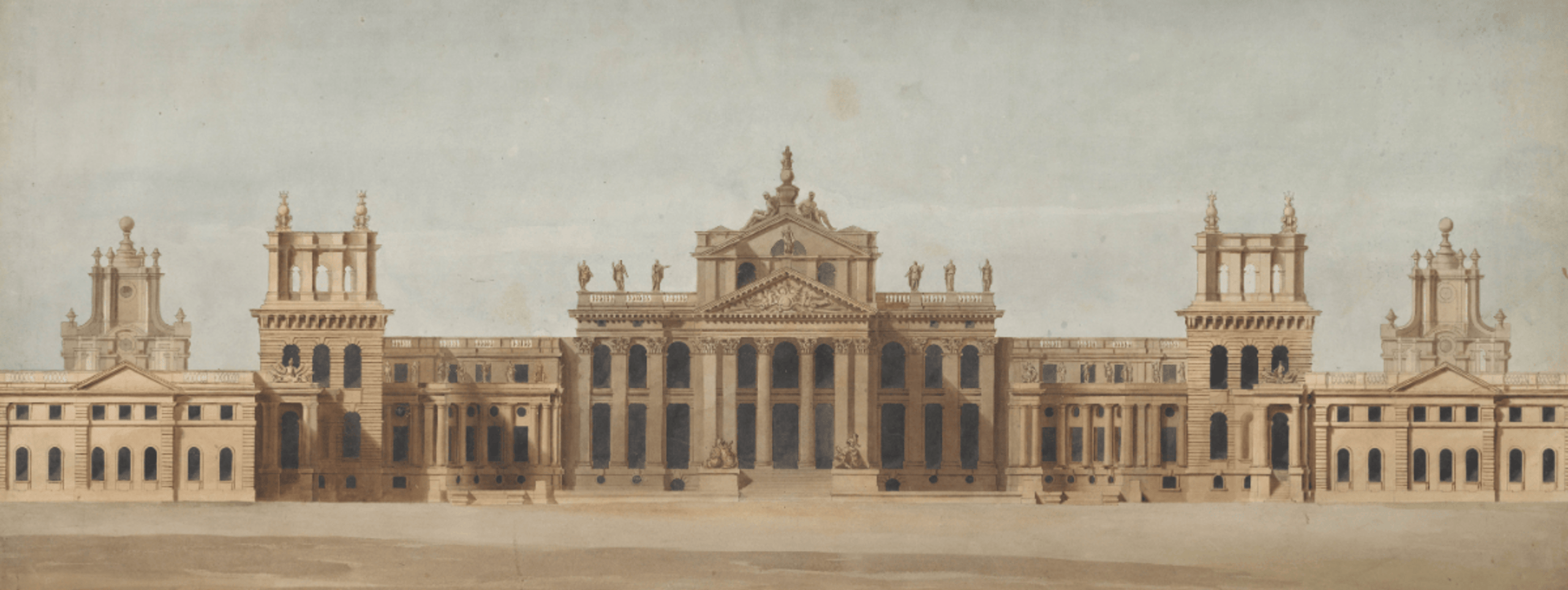 A large classical architecture building featuring prominent columns, set against a clear sky.