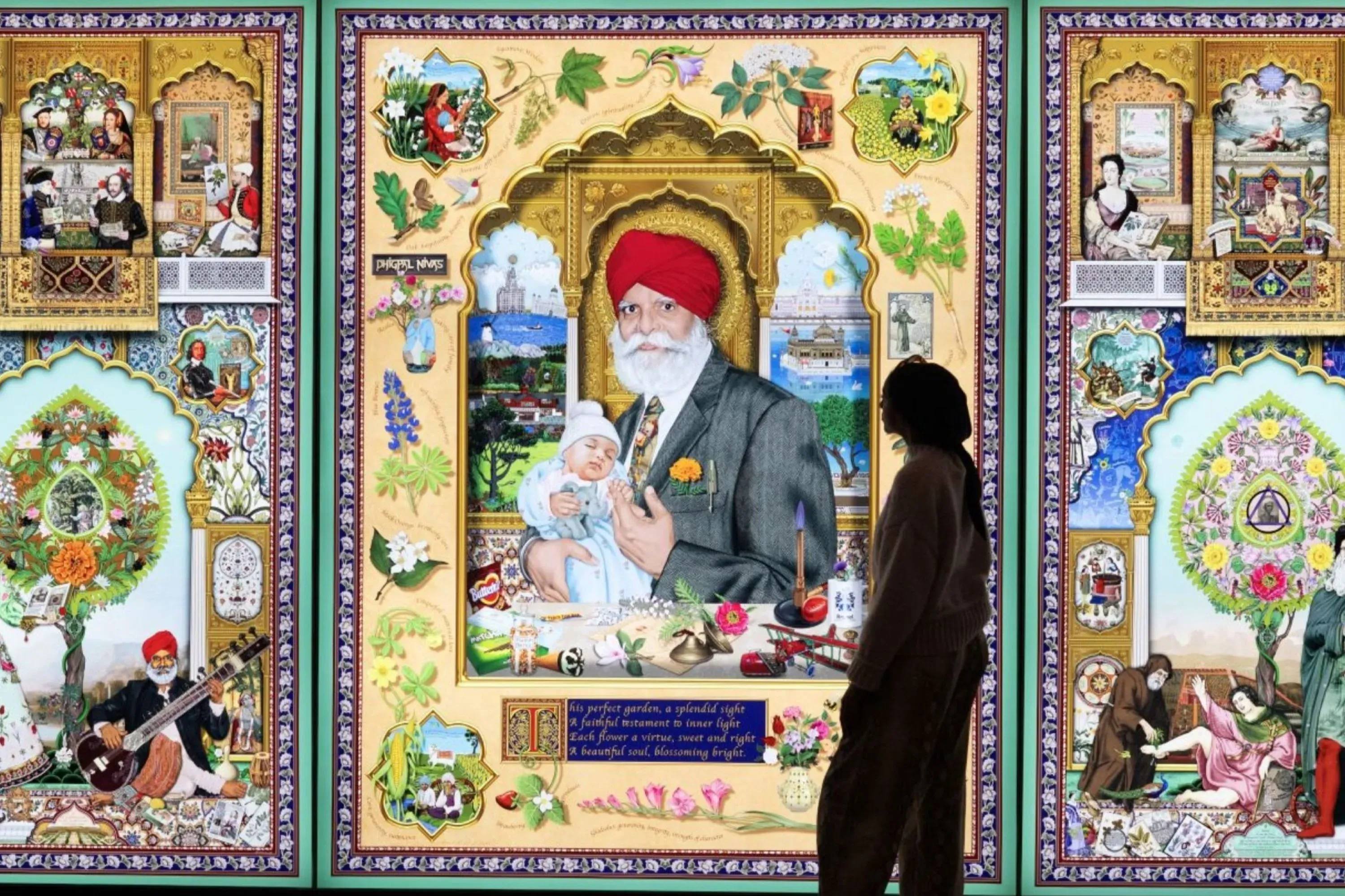 A woman stands in front of a large painting, which is displayed in an ornate picture frame. She is wearing stylish clothing and is indoors, with art visible around her.