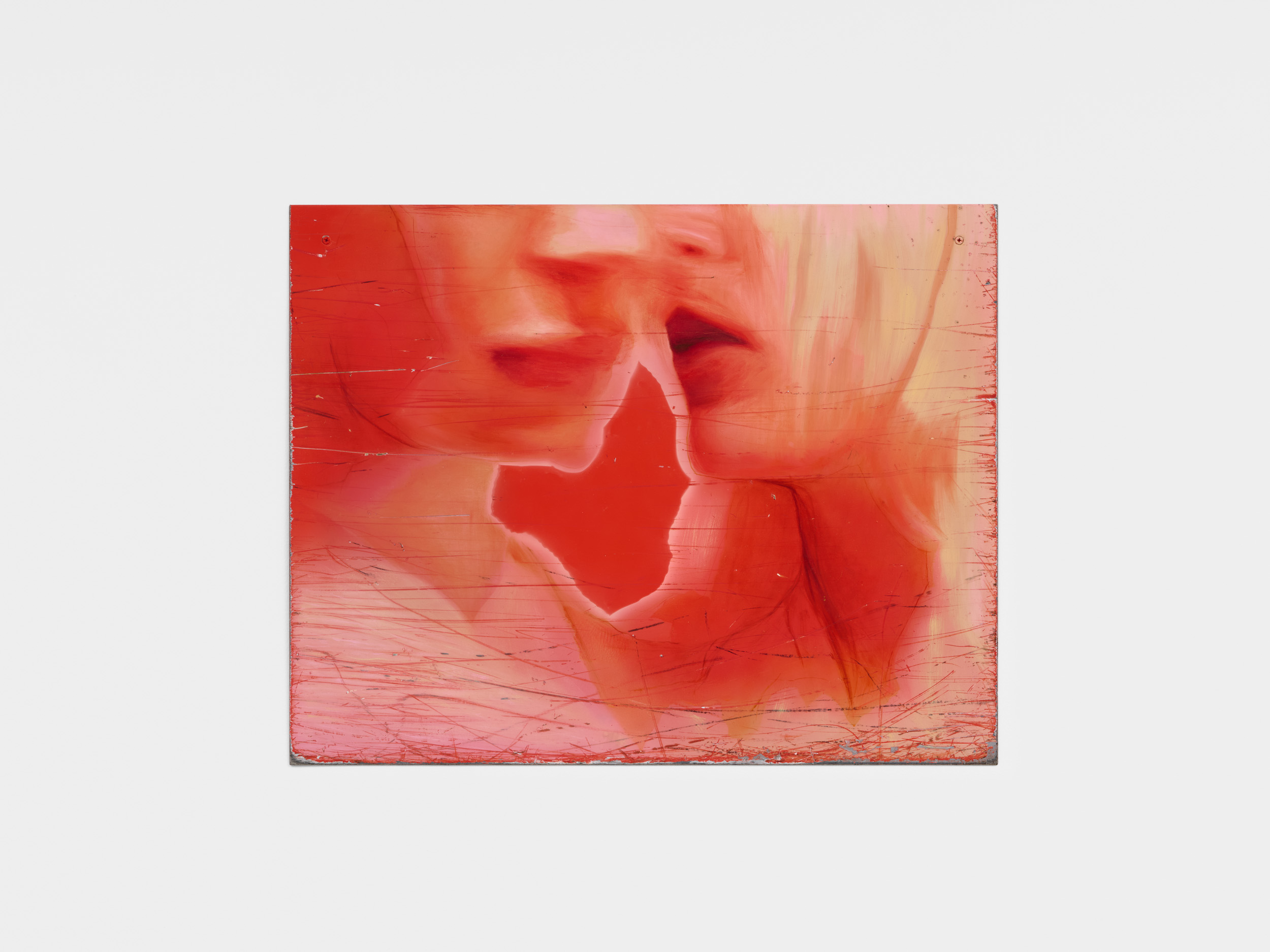 An abstract artwork featuring red tones, depicting fragmented human faces merging and overlapping with a texture that resembles wood grain.