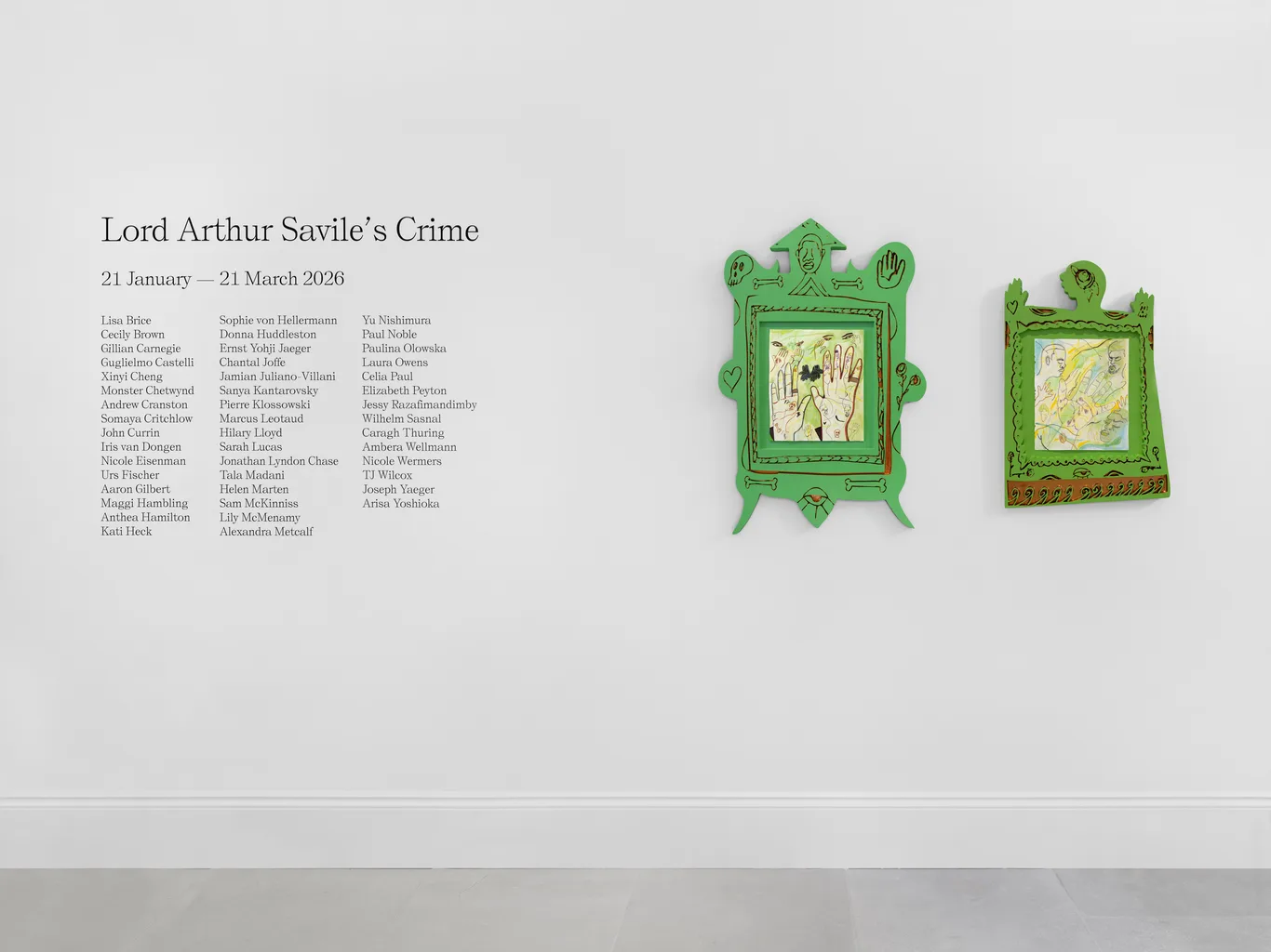 An exhibition wall listing details about "Lord Arthur Savile's Crime," including dates and names of contributors, along with two green-framed artworks.