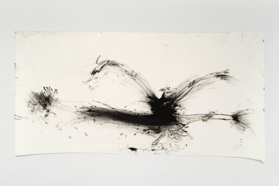 Abstract artwork featuring dynamic black strokes on a white background, creating an impression of movement and energy.