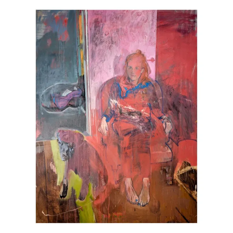 A figure sitting on a chair in a colorful, abstract space, with a dog beside them. The colors are blended and vibrant, creating an impressionistic effect.