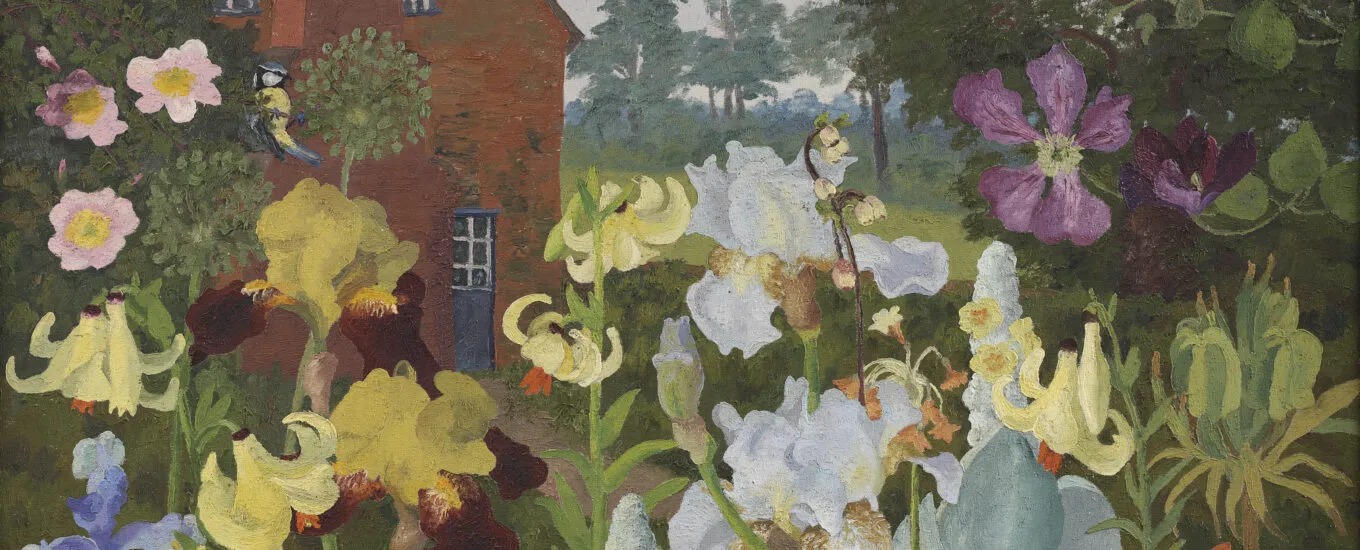 A vibrant floral scene featuring a variety of colorful flowers, including irises and lilies, with a brick house and trees in the background.