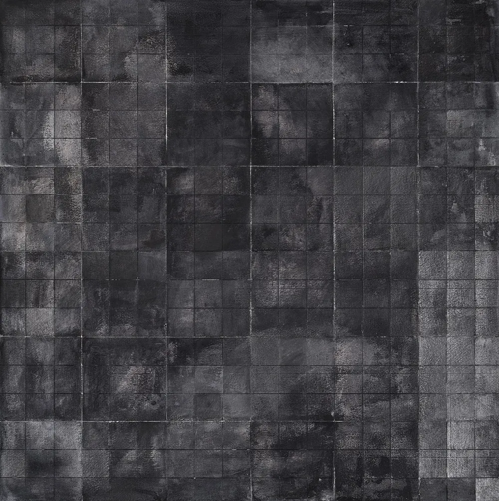 A textured abstract artwork featuring various shades of black and gray, arranged in a grid-like pattern.