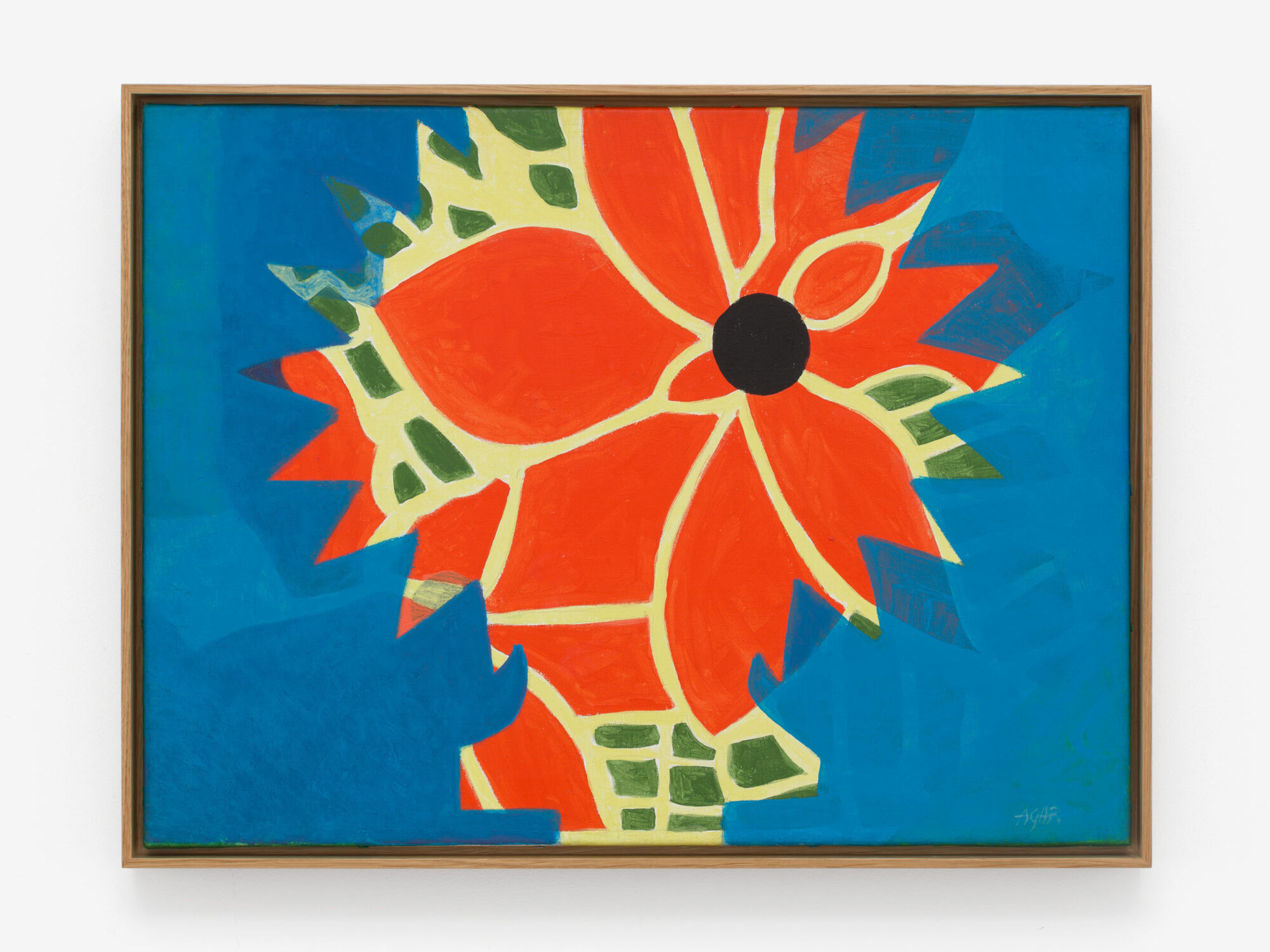 A vibrant abstract painting featuring bold red and orange floral shapes against a bright blue background, framed in wood.