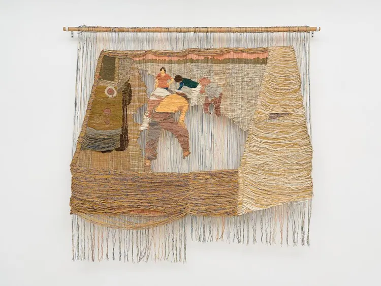 Textile artwork depicting figures engaged in a scene, with a textured, layered design and various earth tones.