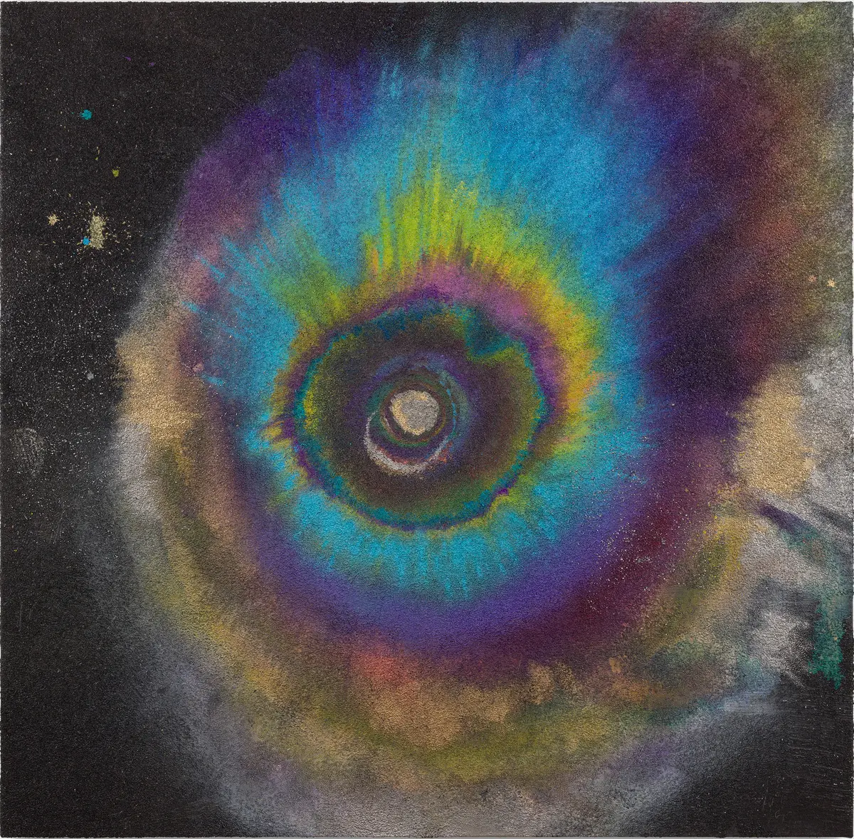 A vibrant, multicolored spiral pattern resembling a cosmic or celestial object against a dark background.