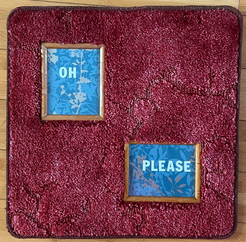 Two framed pictures with the words "OH" and "PLEASE" on a textured red rug.