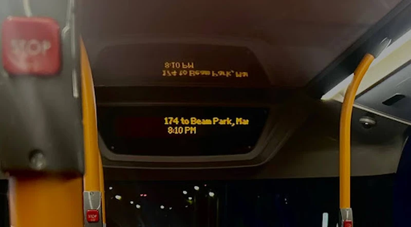 Bus destination display showing "174 to Beam Park, Max 8:10 PM".