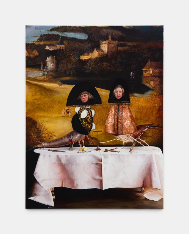A surreal artwork depicting two figures with unusual headgear resembling picture frames, standing behind a table adorned with various objects, set against a rural landscape.