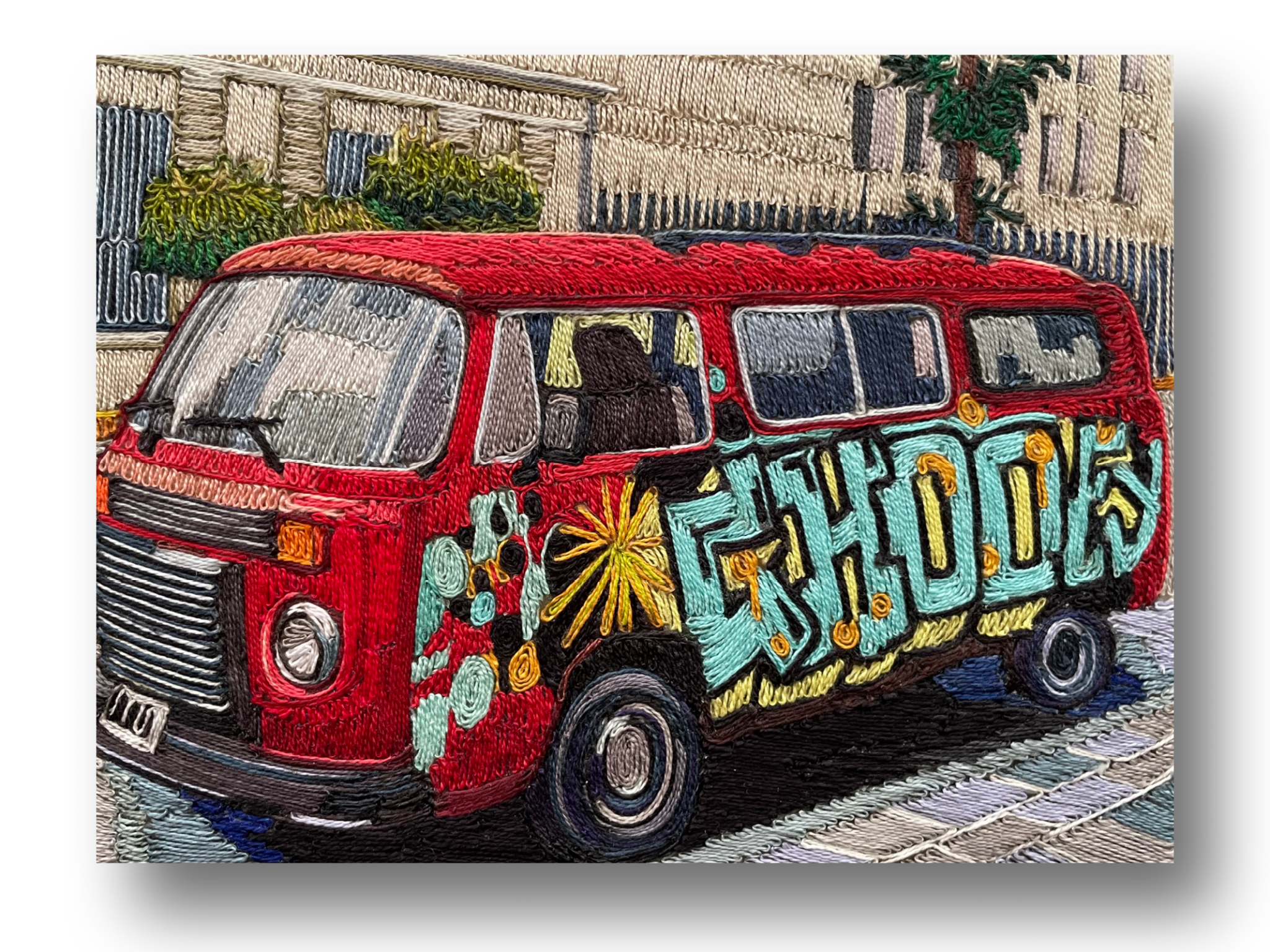A red van with colorful graffiti-style lettering that spells "CHOOL," set against a cityscape background.