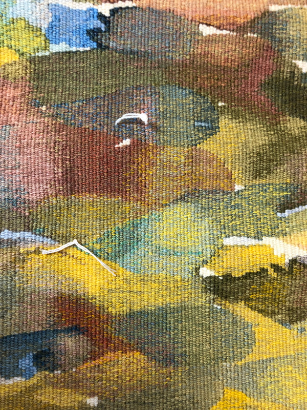 Abstract painting with a blend of muted colors including greens, yellows, and browns.