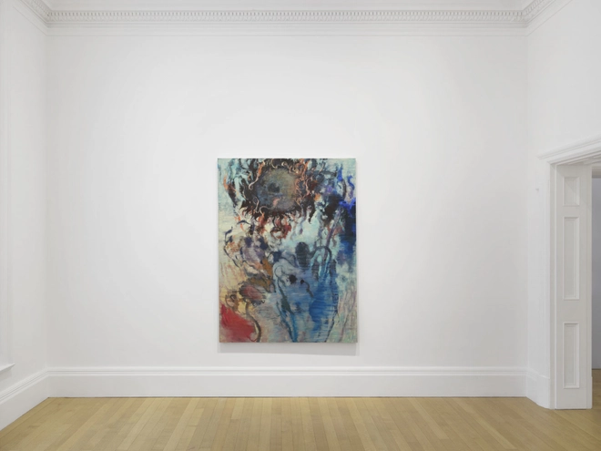 Minimalist white gallery room with ornate molding, pale wood floor, and a colorful abstract painting; open doorway adds a calm, airy mood.