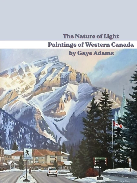 Poster for “The Nature of Light: Paintings of Western Canada” by Gaye Adams, showing snowy Rocky Mountain peaks above a town street, evergreen trees, and a Canadian flag; calm, wintry mood.